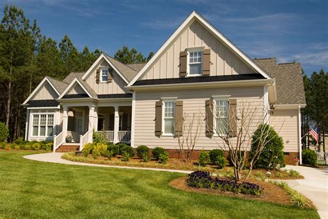 metal red roof house with tan or light brown trim|tan and white house colors.